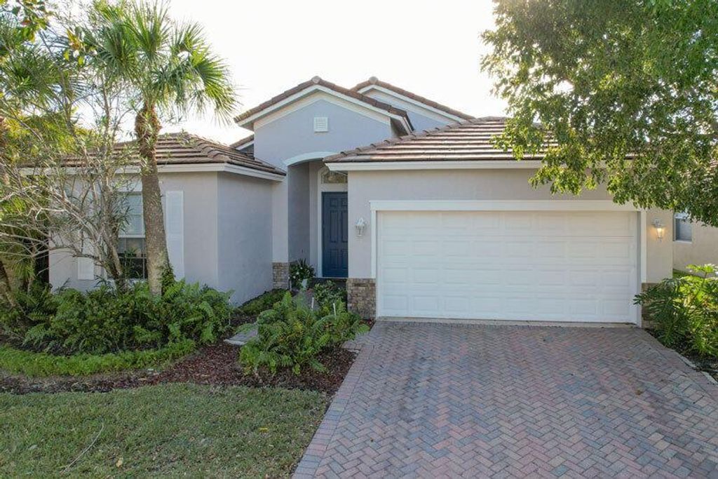 Photo of 9517 SW Flowermound Circle, Port Saint Lucie, FL 34987 (MLS # R10768474)