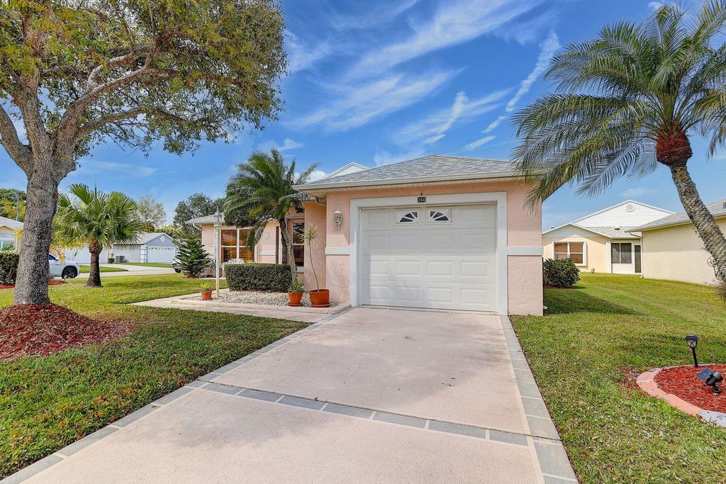 Photo of 360 Paurotis Lane, Fort Pierce, FL 34982 (MLS # R10968413)