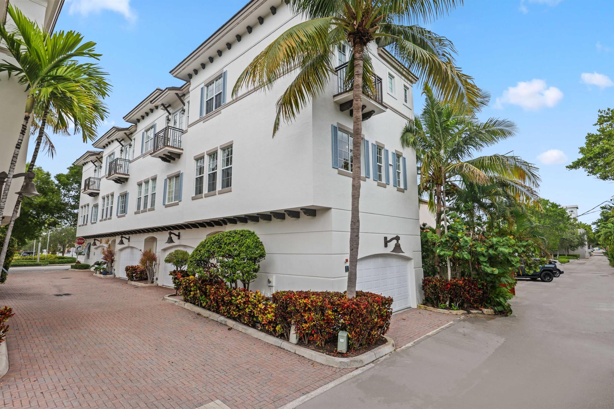 When only the best will do! This beautifully appointed, furnished turn-key corner-unit townhome in the heart of downtown Delray Beach offers 2 bedrooms, 2.5 baths, and a 2-car garage. Features include hardwood floors, lush carpet, 10ft ceilings, impact windows, custom kitchen cabinetry, granite counters, stainless appliances, and custom closets. The bright, light-filled space includes a private balcony off the primary suite. Steps to the community pool, 2 blocks to Atlantic Ave, 1 block to the Intracoastal, and a short walk to the beach.