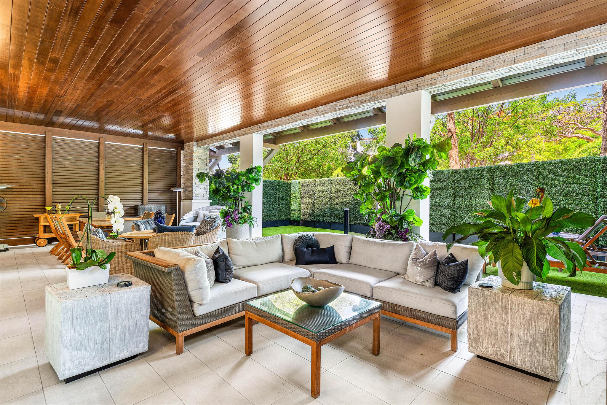 FANTASTIC GROUND FLOOR VILLA OFFERS AN INCREDIBLE OVERSIZE OUTDOOR PATIO, WITH DOG-FRIENDLY TURF AND 7-FOOT HIGH HEDGES FOR COMPLETE PRIVACY. EASY ACCESS TO OUTSIDE. 2 BEDROOMS PLUS DEN PROFESSIONALLY DECORATED WITH WALLPAPER AND ELECTRIC BLINDS, 11-FOOT CEILINGS: NO STAIRS OR ELEVATOR, NEARBY GARAGE. WALK TO BEACH, MIZNER PARK, AND MULTITUDE OF NEARBY RESTAURANTS AND SHOPS. INCREDIBLE LIFESTYLE IS AWAITING YOU. 24-HOUR SECURITY, FITNESS CENTER, SPA, POOL, PUTTING GREEN, CLUBROOM, AND MORE...
