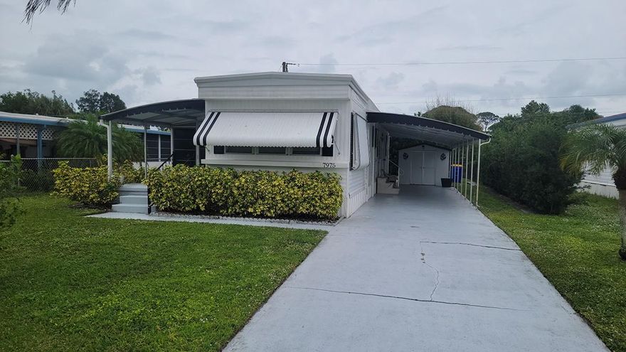 Discover the ideal blend of comfort and convenience in this expanded singlewide home in Hobe Sound, Florida. This property features a new AMS aluminum roof and trim (2021), ensuring durability. The spacious lot, where you own the land, offers ample outdoor space, enhanced by privacy shrubs and a secure 2021 chain link fence. Inside, find fresh insulation and interior paneling (2023), creating a welcoming atmosphere. The property includes a large shed with essential utilities like a washer and dryer. Enjoy the freedom of no HOA, and all pets are welcome, adding to the appeal of this cozy home. Its location in the serene Hobe Sound area is perfect for those seeking a peaceful retreat, yet it remains close to local amenities, offering a unique blend of tranquility and convenience.