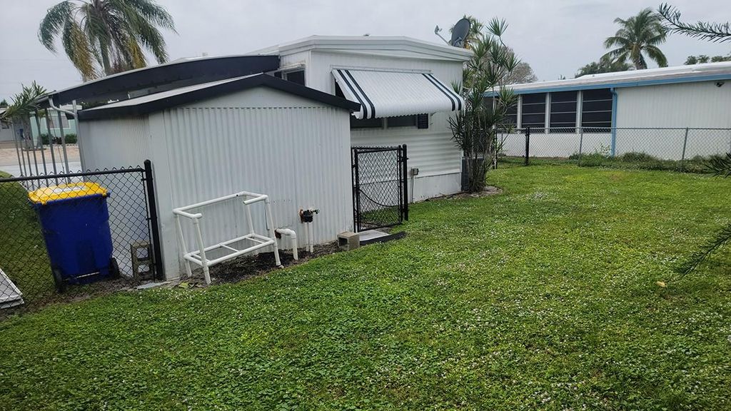 Photo of 7975 SE Wren Avenue, Hobe Sound, FL 33455 (MLS # F10416384)