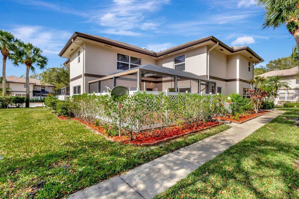 Lovely townhome in Stamford of Royal Palm Beach! 2 generous sized bedrooms, 2.5 bathrooms. Tile flooring throughout, Spacious living areas with eat in kitchen-granite counter, dining room, family room. Lots of storage and large closets in the bedrooms. Pull down stairs to attic. Enjoy time with family and cook-outs in your large private patio which is screened and tiled! 2 assigned parking spots. Impact windows. A/C 2019, New roof, Updated appliances. Internet is included in monthly dues. Ready for your personalization!