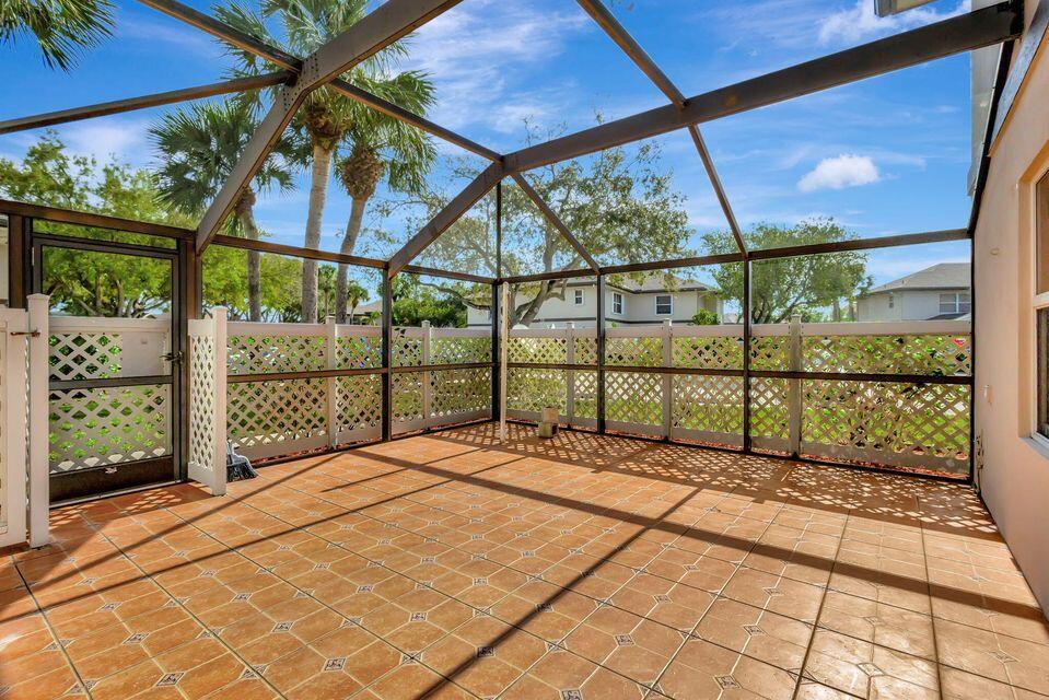 Spacious townhome in Stamford of Royal Palm Beach! 2 generous sized bedrooms, 2.5 bathrooms. Tile flooring throughout, Spacious living areas with eat in kitchen-granite counter, dining room, family room. Ready for your personalization! Lots of storage and large closets in the bedrooms. Enjoy time with family and cook-outs in your large private patio which is screened and tiled! 2 assigned parking spots for you in front of the building, guest spots throughout. Impact windows. A/C 2019, New roof, Updated appliances. Internet is included in monthly dues. Beautiful community pool with lots of seating around and restrooms and a shower. Walking distance to schools, shopping, dining and parks. All measurements are approximate.