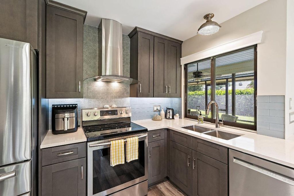 Photo of 10690 SE Jupiter Narrows Drive, Hobe Sound, FL 33455 (MLS # R11123904)