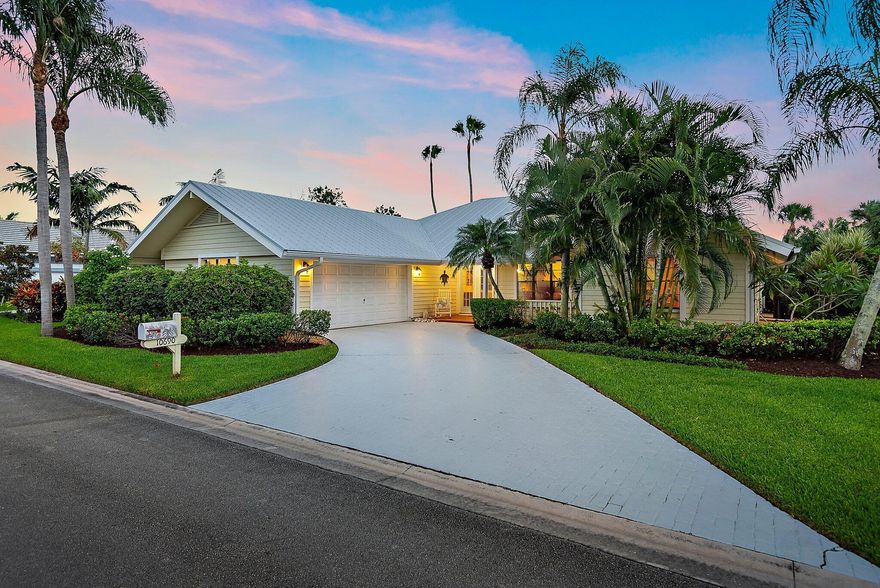 This charming Key West-style residence features three bedrooms, two bathrooms, and a spacious two-car garage. Nestled in a tranquil neighborhood surrounded by natural beauty, it's the ideal retreat for those who enjoy an active, outdoor lifestyle.Inside, the open-concept design creates a welcoming atmosphere, with the living, dining, and kitchen areas flowing seamlessly together. Expansive windows and sliding glass doors invite an abundance of natural light. The newly renovated kitchen boasts sleek stainless-steel appliances, high-end cabinetry, and expansive counter space. Designed with both style and function in mind, it's perfect for everyday meals as well as entertaining. A modern fume hood and thoughtful finishes complete the space.