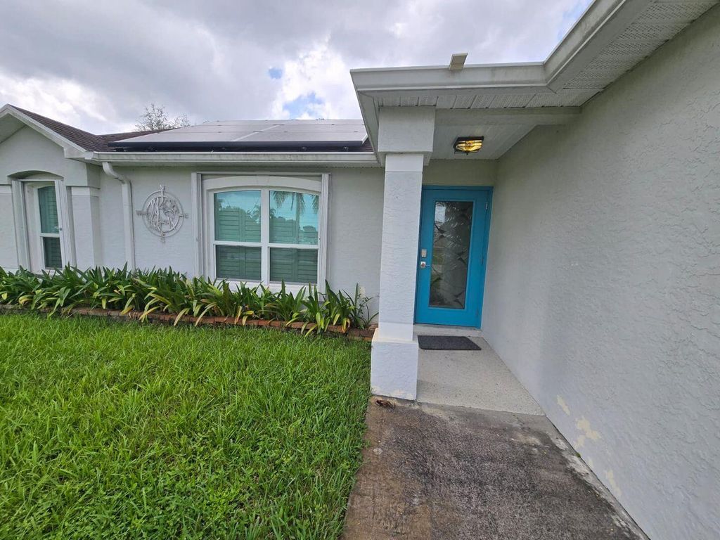Photo of 862 SW Carmelite Street, Port Saint Lucie, FL 34983 (MLS # R11124922)