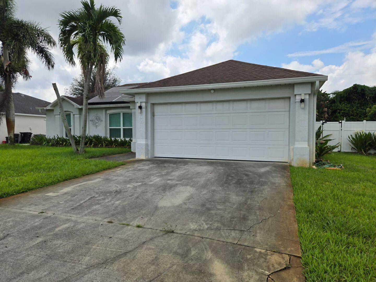 Port St. Lucie Single-Family home with Fenced Yard and Pool! FULLY FURNISHED!Situated in the heart of Port St. Lucie, this spacious home on SW Carmelite Street offers plenty of room to enjoy Florida living. The bright, open layout makes everyday life comfortable, with ample living space for relaxing or hosting friends. Fresh natural light and a versatile design give you the flexibility to make the space feel like your own.Step outside to a private pool and fenced yard, ideal for soaking up the sunshine or enjoying casual outdoor gatherings. Located near local parks, schools, shopping, and quick highway access, this home combines neighborhood charm with everyday convenience. A solid rental choice for anyone looking to enjoy the Florida lifestyle in a desirable location.NO HOA!