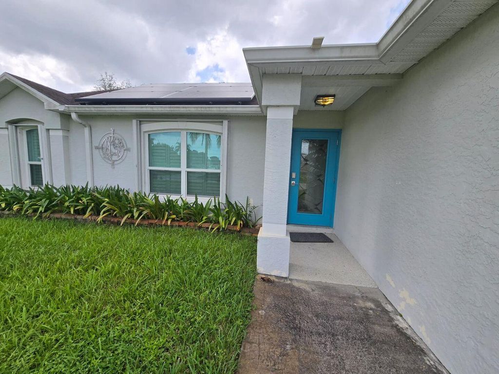 Photo of 862 SW Carmelite Street, Port Saint Lucie, FL 34983 (MLS # R11124922)