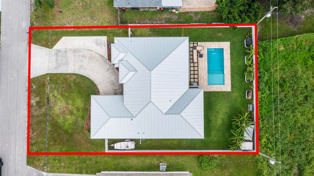 Photo of 1280 SW Kalevala Drive, Port Saint Lucie, FL 34953 (MLS # B26011798)