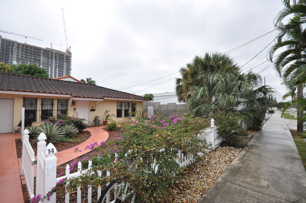 Photo of 10 Evergreen Drive, Lake Park, FL 33403 (MLS # R11169614)