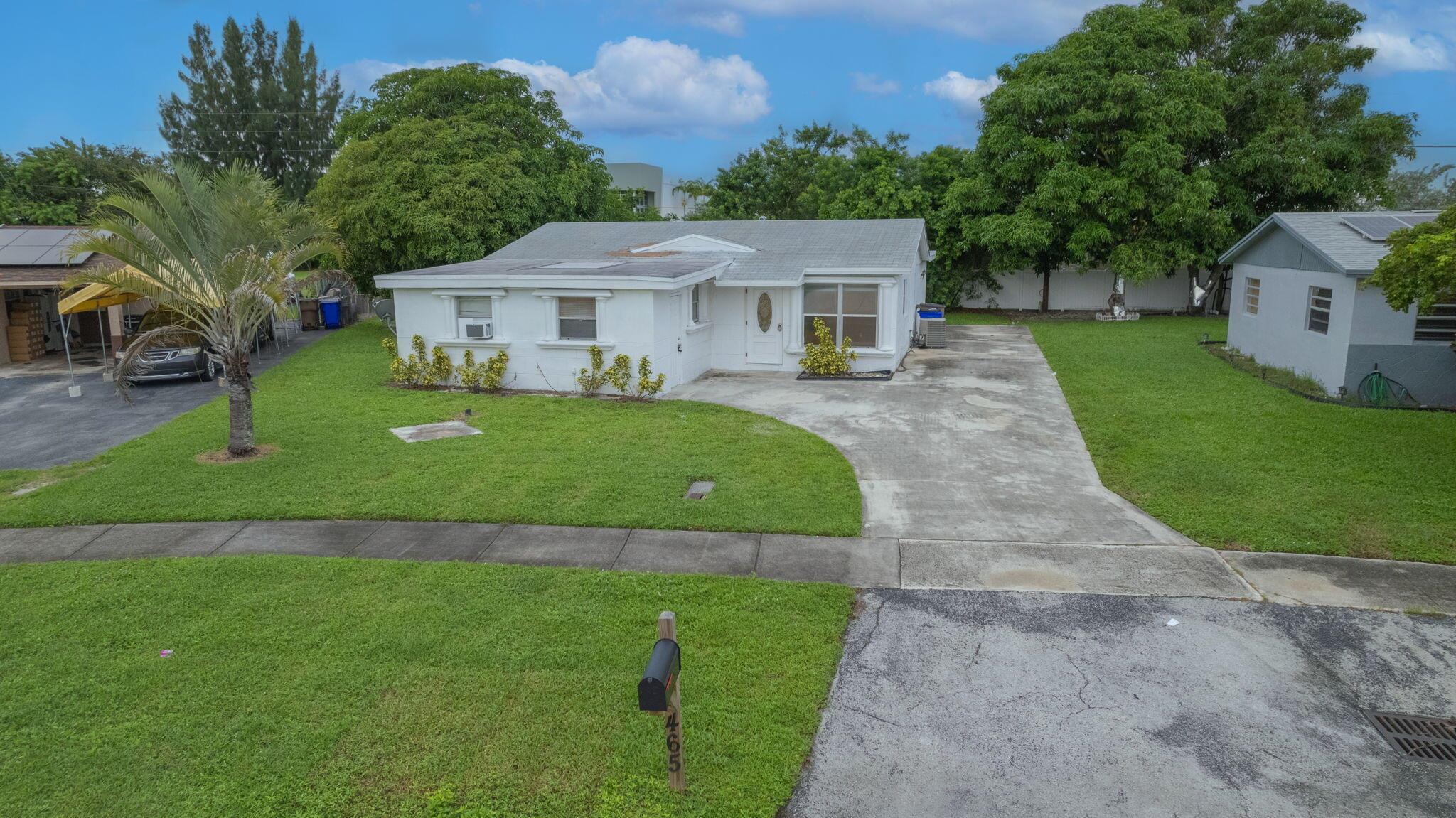 Situated on the bend of a quiet, and peaceful enclave in Deerfield Beach, you'll find this oversized house on an enormous lot that offers your family a spacious and special place to call home. This home boasts a perfectly laid out 4 bedroom, 2 full bathroom (with two entrances!) that has just been fully remodeled. The kitchen has an open floor plan that is prime for entertaining. Huge backyard that's perfect for kids or families. Professionally managed, this home won't last long!