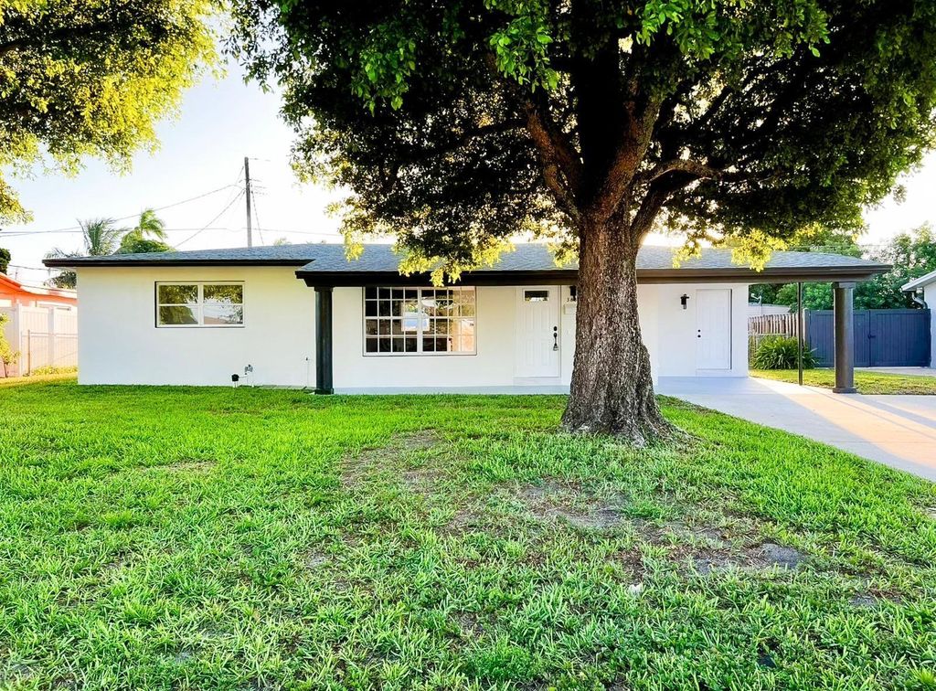 Photo of 3831 Engle Road, Lake Worth, FL 33461 (MLS # R11110288)