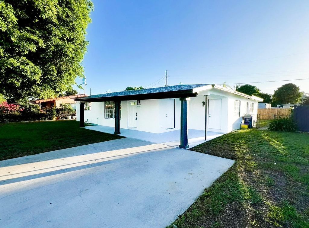 Photo of 3831 Engle Road, Lake Worth, FL 33461 (MLS # R11110288)