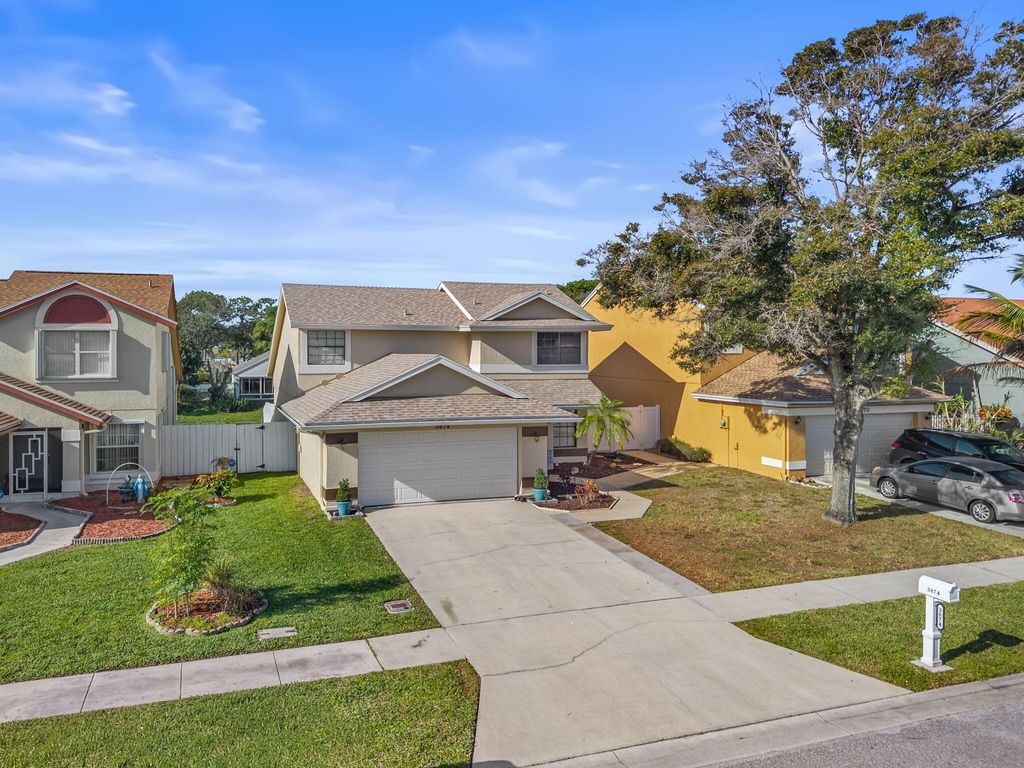 Photo of 3874 Circle Lake Dr, West Palm Beach, FL 33417 (MLS # B26001023)