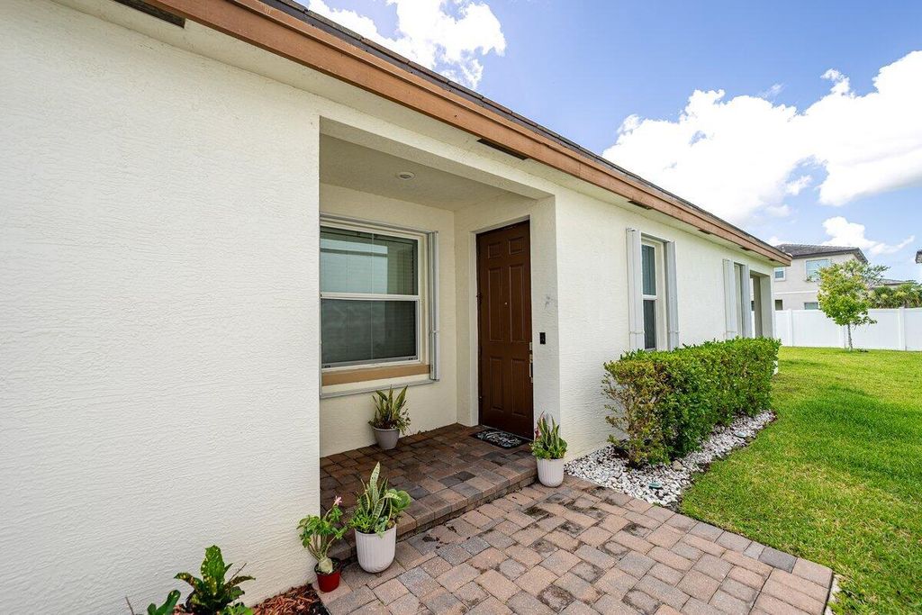 Photo of 12516 NW Toblin Lane, Port Saint Lucie, FL 34987 (MLS # R11114557)