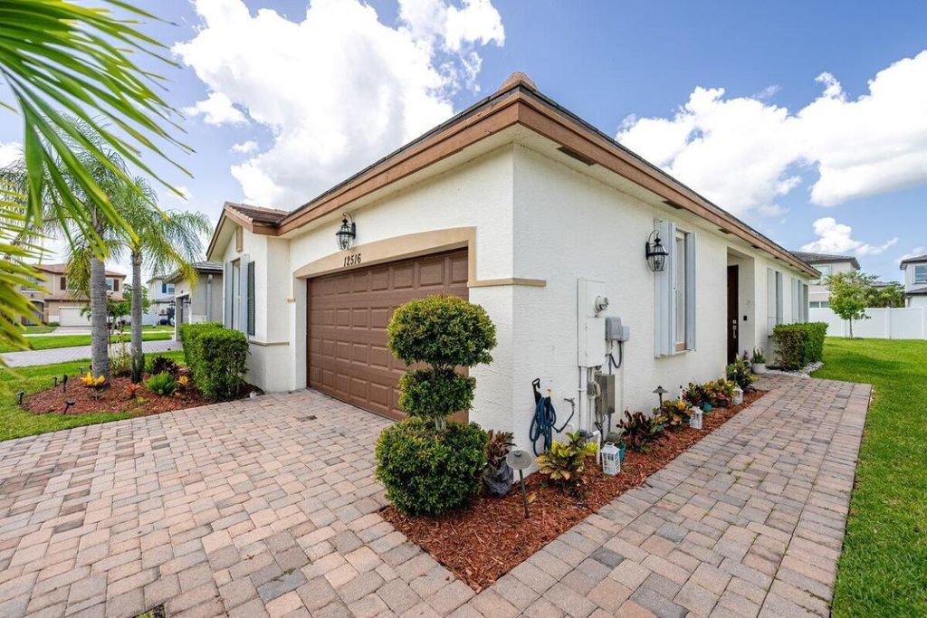 Photo of 12516 NW Toblin Lane, Port Saint Lucie, FL 34987 (MLS # R11114557)