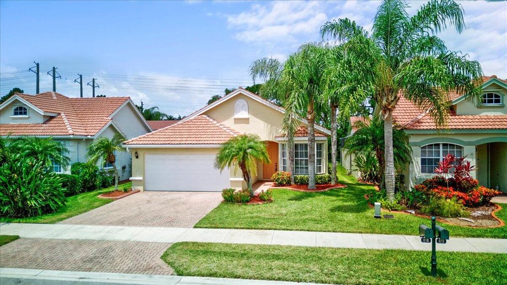 Photo of 816 SW Munjack Circle, Port Saint Lucie, FL 34986 (MLS # R10900899)
