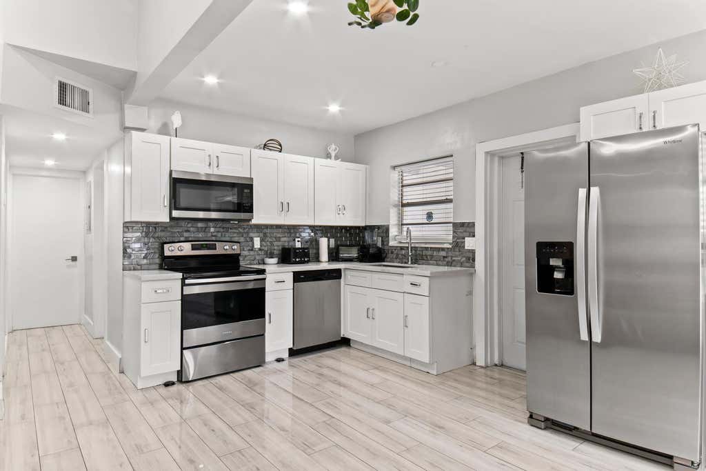 Photo of 371 Kentucky Avenue, Fort Lauderdale, FL 33312 (MLS # B26054021)