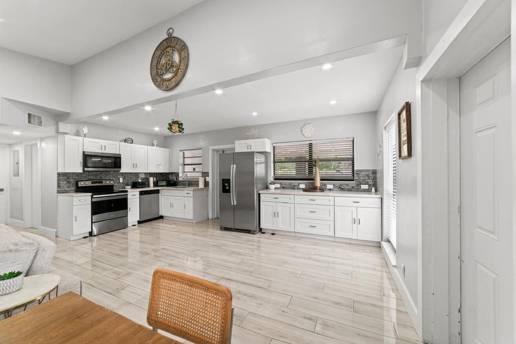 Photo of 371 Kentucky Avenue, Fort Lauderdale, FL 33312 (MLS # B26054021)