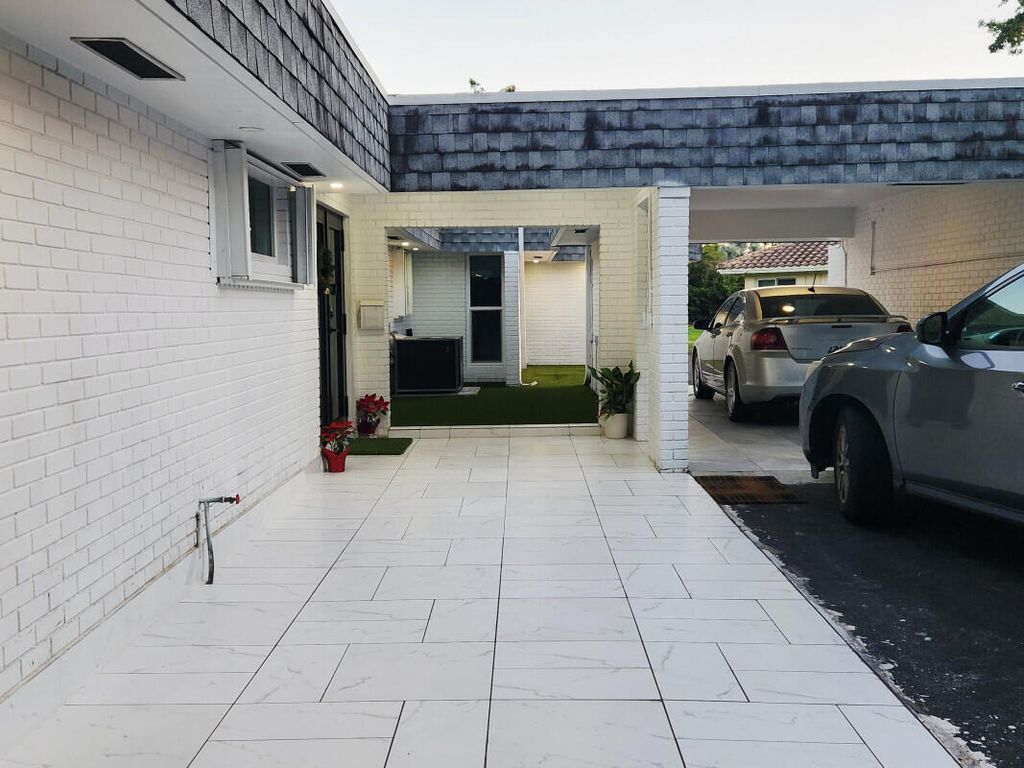 Photo of 5707 White Hickory Circle, Tamarac, FL 33319 (MLS # B26015590)