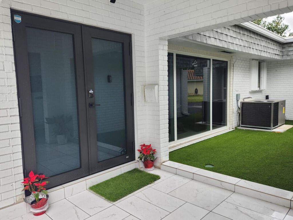 Photo of 5707 White Hickory Circle, Tamarac, FL 33319 (MLS # B26015590)