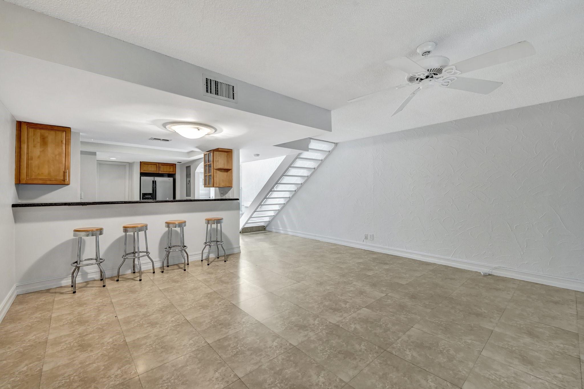 Corner fee simple townhouse in the heart of Wilton Manors. Surrounded by lush landscaping and mangrove, this pet friendly property offers many great features including an attached carport with extra storage, New Roof, Florida room, open kitchen with granite counter tops & stainless-steel appliances, washer & dryer inside the unit, and a powder room. Ideal location – 10 min walk to the Wilton Drive with many restaurants, bars, shopping, galleries, gyms, Pharmacy and Publix; and only 10 min drive to Fort Lauderdale Beach and Downtown.