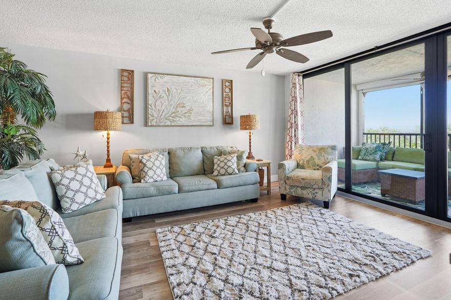 Welcome to Hillsboro Landings II, a hidden gem perfectly positioned where the Hillsboro River meets the Intracoastal Waterway in beautiful Deerfield Beach. This highly sought-after 94-unit waterfront community offers unbeatable walkability—just steps from the sandy shores of Deerfield Beach, the pier and boardwalk, Sullivan Park, and the vibrant dining and shopping options at The Cove Plaza. This spacious 2-bedroom, 2-bath condo features 1,233 sq. ft. of comfortable living with thoughtful updates throughout. Enjoy a coastal vibe in the living room with a custom coastal wall board behind the TV, a beautifully redesigned custom laundry area, granite countertops, updated flooring and baseboards, and a large primary bedroom with a walk-in closet and a dark wood custom closet organizer.