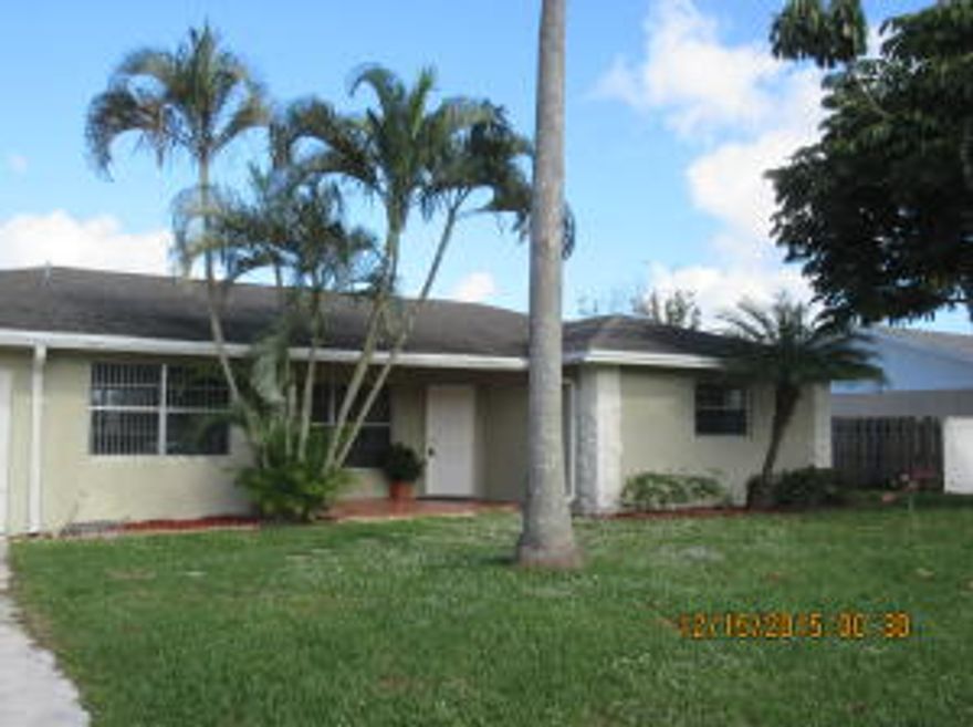 Well maintained & upgraded CBS 2/2/1 w/Large family or bonus room. Nice larger tile newer carpet in bedrooms textured ceilings. Newer D/W Refrigerator smooth range, washer & dryer Private fenced back yard. Newer  interior paint. Close to shopping , dining, beaches& I95 ( Note new garage door permitted for end of year)