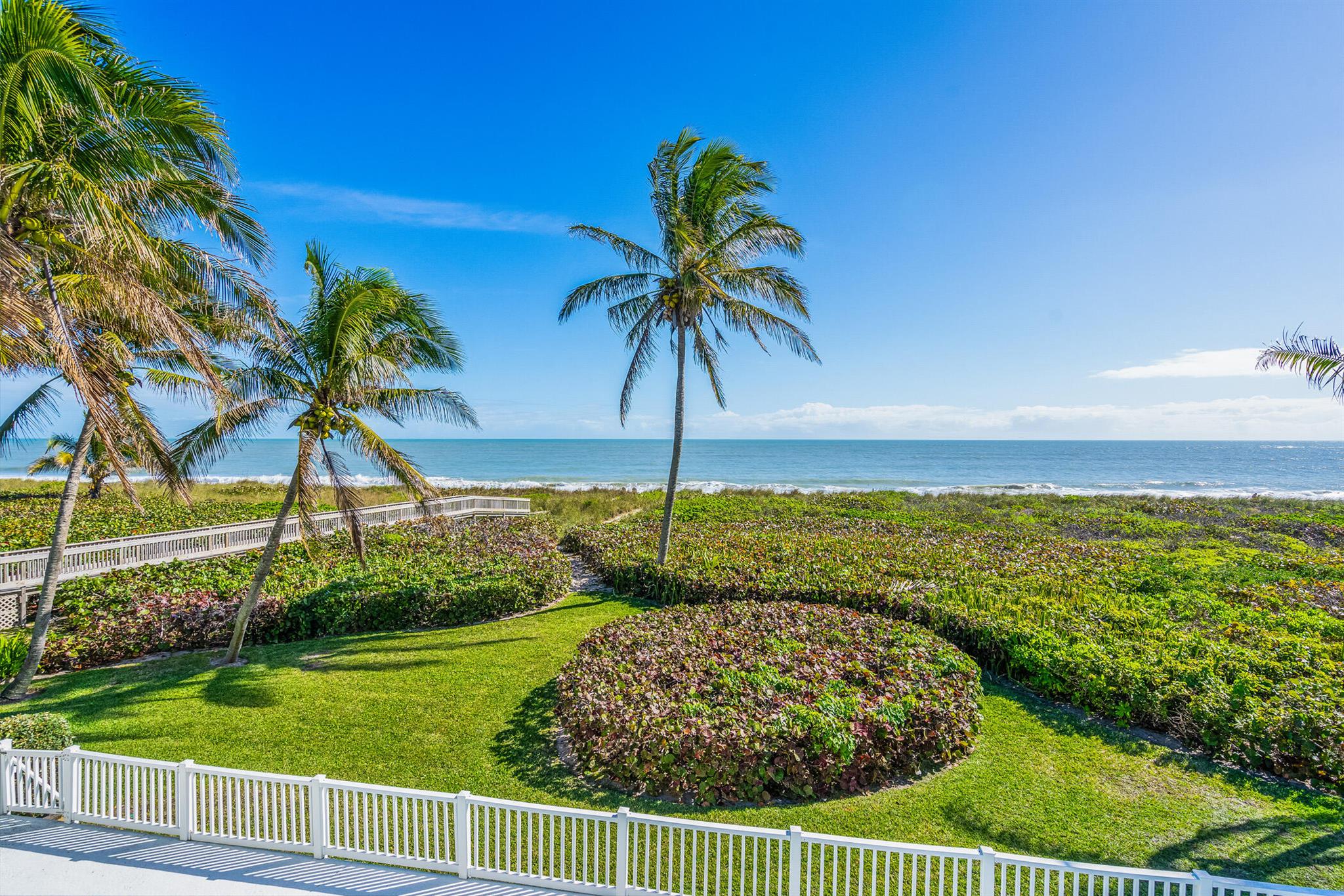 Direct OCEANFRONT home in a private gated community located on a sprawling ACCRETING beach, offering an ideal canvas for building new or renovating. Embrace coastal tranquility while being a short drive from modern amenities; this oceanfront property is just 5 miles from Vero's Ocean Drive District. This is a rare opportunity to create your coastal dream retreat where you can occupy or rent the existing home during the design and planning phase, allowing you to enjoy the pristine seaside setting immediately. A survey and additional information are available.