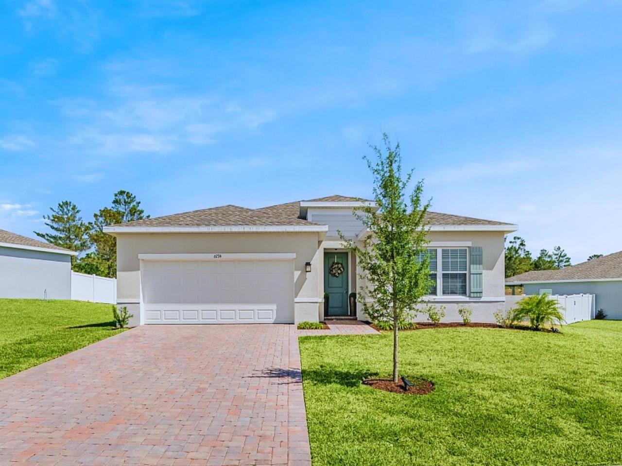 Why wait to build? This 2024 CBS home in gated Lost Tree Preserve showcases every builder upgrade, from custom lighting fixtures to premium finishes throughout. The open split floorplan offers volume ceilings, complete impact windows/doors, and a luxury-inspired kitchen with stainless appliances. Step into the lanai overlooking a private, preserve-lined backyard—perfect for relaxing or entertaining. Plenty of space to add your dream pool and the kids playground. Enjoy resort-style amenities: clubhouse, pool, gym, and pickleball. Minutes from the beaches, shopping, and top rated schools.