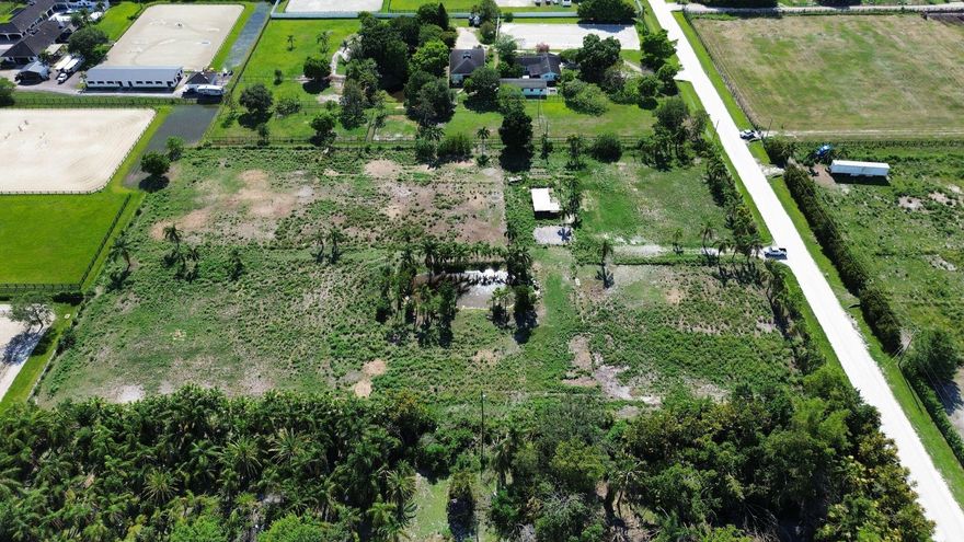 5.26 acres of equestrian land in beautiful Rustic Ranches in Wellington Florida. Close to the Horse Show and Wellington Preserve. City water. Cleared. High and dry.