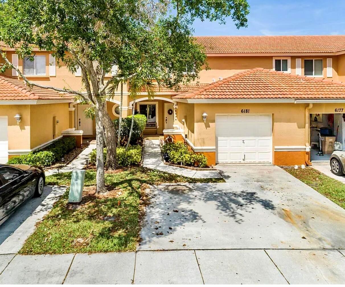Spacious 2 bedroom, 2.5 bath townhome with open concept living. Renovated with updated kitchen with quartz counters and updated master bathroom. Painted recently, private patio, 1 car garage and 2 space driveway