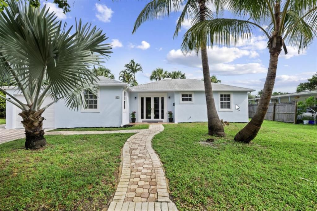 Photo of 125 Beverly Road, West Palm Beach, FL 33405 (MLS # R10822267)