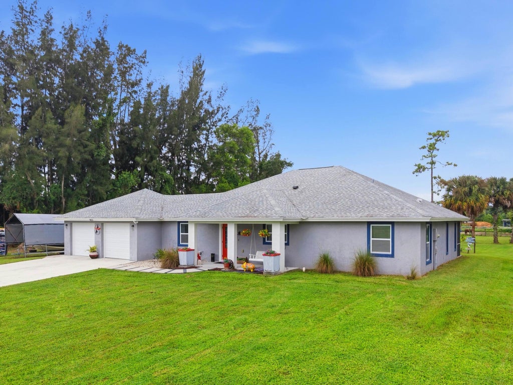 Photo of 14171 BIDDEX Road, Loxahatchee Groves, FL 33470 (MLS # B26072560)