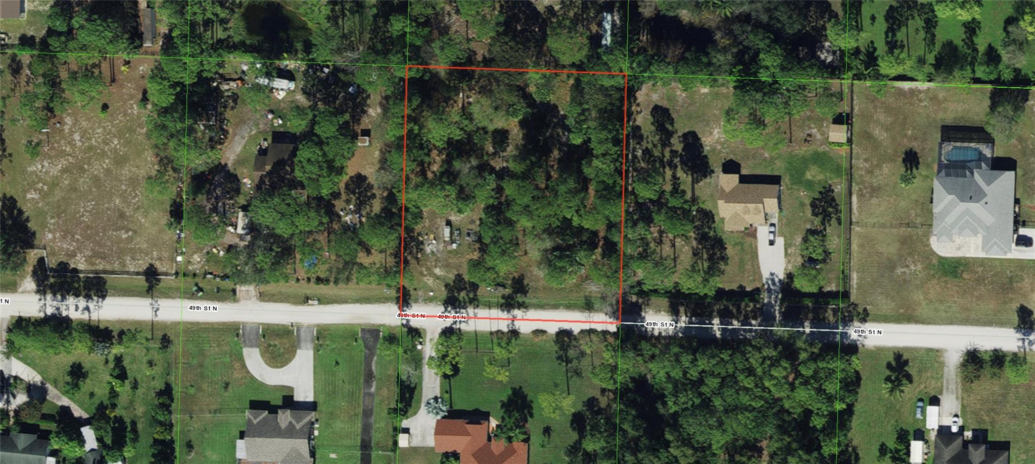 NOT in the flood zone! The trees are not too thick on this particular lot, so that will save you thousands in land clearing costs vs most others available. Priced to sell quickly. Just two lots off the paved road. You can drive to the city the entire way on paved roads from 180th Ave N, just two lots over. Publix, shopping, emergency care, etc are all just a few minutes drive from this lot at the Westlake Plaza! Top notch schools, with easy access to town. Lots of the same size have sold well over our asking price in the area within the last month. Very nice homes nearby. Being in the most ideal rated "high and dry" FEMA flood zone (X) means you should NOT be federally required to have flood insurance, buyer to confirm. Parcel# 00-40-43-10-00-000-1220.