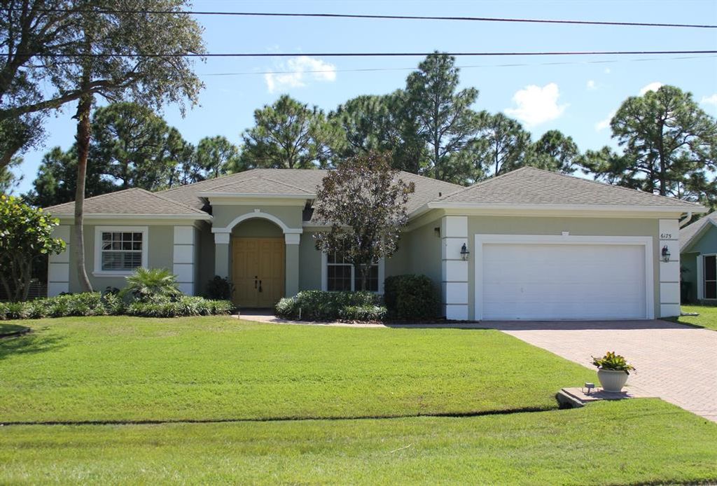 Photo of 6175 NW East Deville Circle, Port Saint Lucie, FL 34986 (MLS # R10751089)