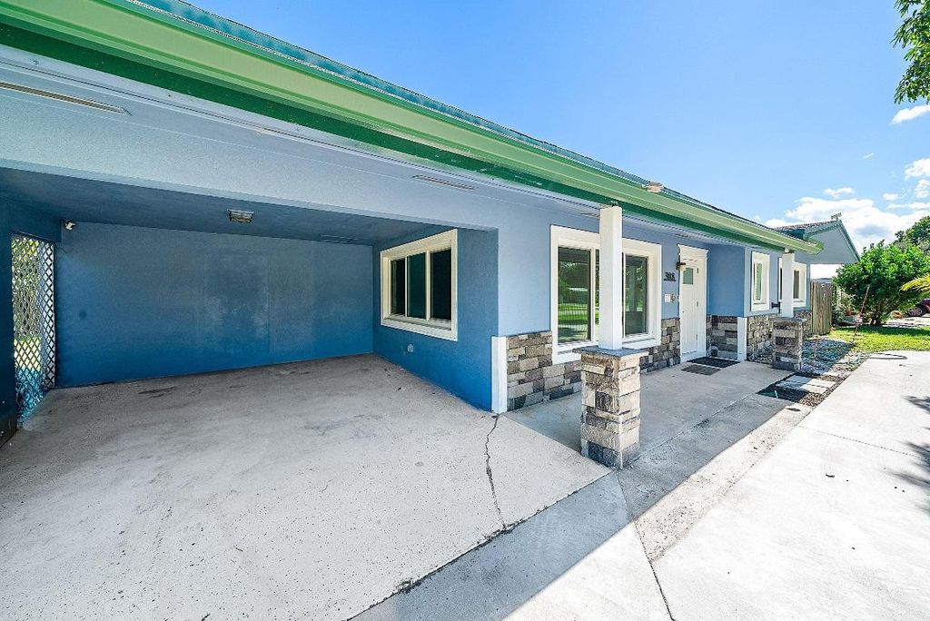 Photo of 308 Philadelphia Drive, Jupiter, FL 33458 (MLS # R11134364)