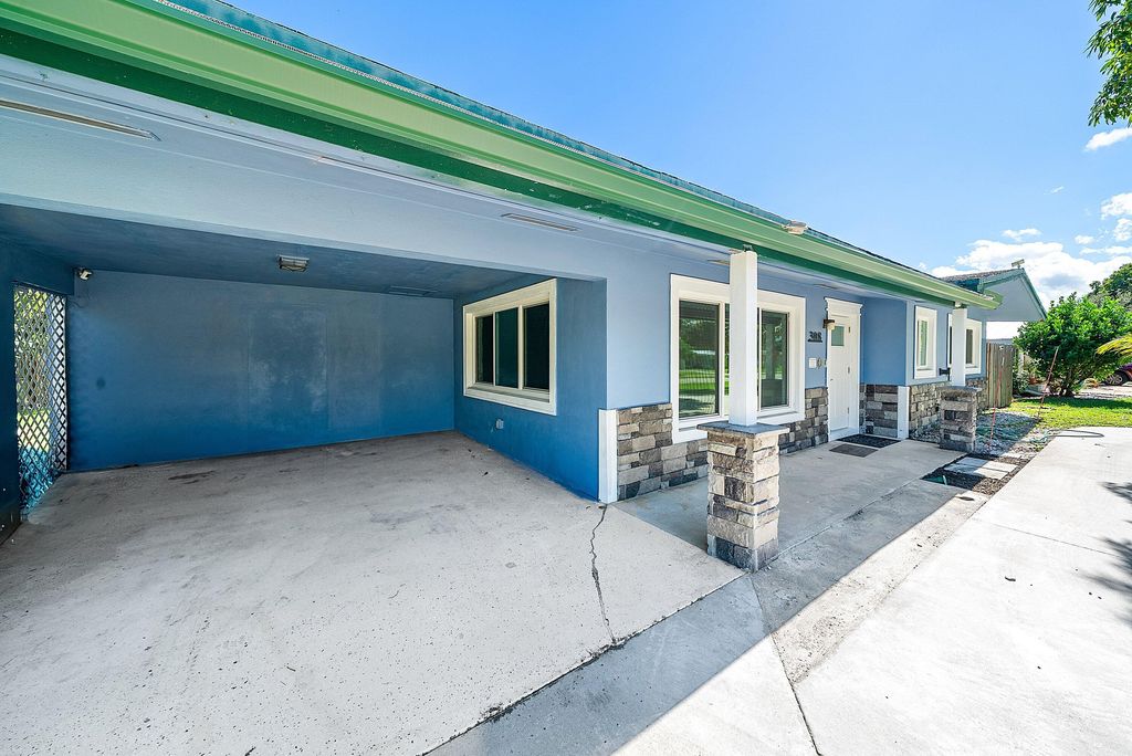 Photo of 308 Philadelphia Drive, Jupiter, FL 33458 (MLS # R11134364)