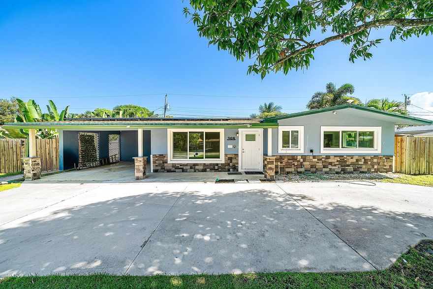 Discover the perfect blend of style and comfort in this beautifully renovated 3-bedroom, 1.5-bath home located in the heart of Jupiter. Every detail has been thoughtfully updated -- from the modern finishes and sleek flooring to the impact windows offering peace of mind and energy efficiency.Enjoy an open, functional floor plan that flows effortlessly between living spaces, creating the perfect setting for both relaxation and entertaining. Step outside to a huge fenced backyard, ideal for pets, family gatherings, or simply soaking up the Florida sunshine. Lawn care included and super low electric bill!!!