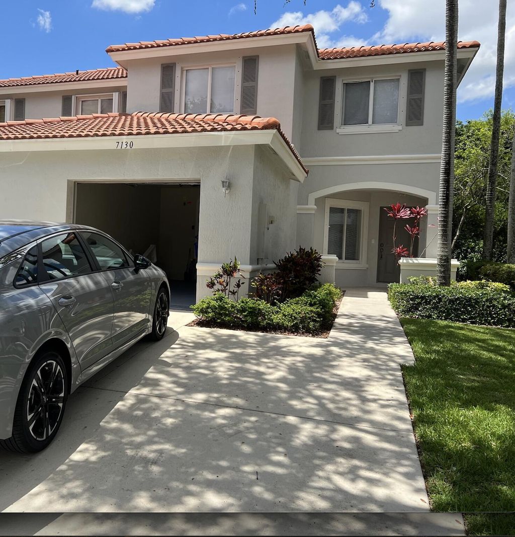 Photo of 7130 Hawks Nest Terrace, Riviera Beach, FL 33407 (MLS # R11025667)