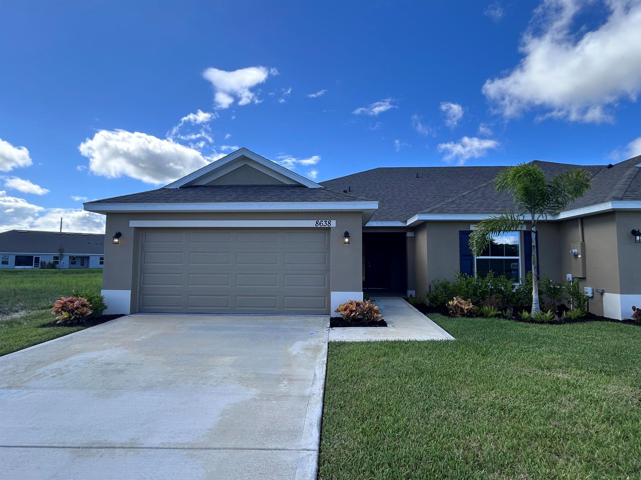 Huge price reduction. Save $29,000 on this move-in ready inventory home. Don't miss out on this very limited opportunity. Save yourself several thousands of dollars in closing costs when using the seller's approved lender. Only $1,000 deposit to secure your new home. NO FLOOD insurance required. Discover your dream villa in this stunning 3-bedroom + Den, 2-bath, 2-car garage. Featuring dual sinks in the owner's suite, a garden tub and separate shower and a covered patio with lake view! Located in the sought-after Waterstone community, just a few minutes from I-95 and pristine beaches, and golf! Convenience is at your doorstep. Enjoy amenities including a heated pool, clubhouse, gym, tennis, pickleball & Beach Volleyball. Lawn service included. New home warranty included