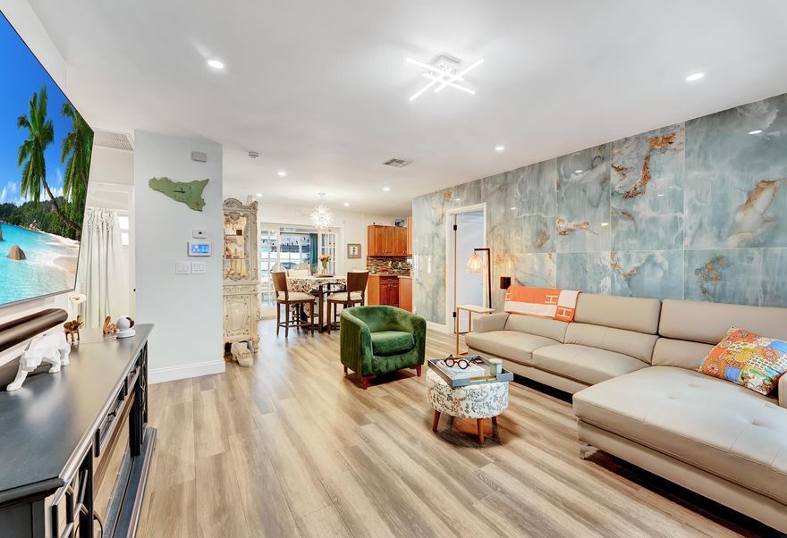 Most desired corner lot in East Delray. Brand new Metal roof, updated finishings, bathrooms, ceilings, lighting. 1.5 miles from the ocean. Close to Downtown Delray, Boca, shops & major highways. A huge project for streets, side-walks and brand new park was just completed, bringing more value to Tropic Palms. Walking Distance to lakes and Boca. Fenced in backyard with extended fence for more greenery, tropical exotic landscaping and more backyard space has been added to this unique home. Chlorine/salt pool. Electrical and AC were just updated. Impact windows and new doors, main areas with beautiful tile and designer Italian Tile on wall. New appliances. None HOA community, enjoy living here, great for families & Investors.