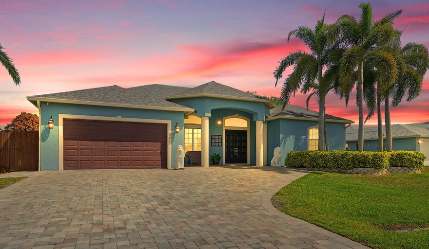 Step into this stunning POOL home, beautifully upgraded 4BR/3BA/2CG, NO HOA with NEW ROOF (2025). The open floor plan features a private in-law suite with direct access to a cabana bath and pool. Enjoy a spacious covered screened area perfect for outdoor dining & entertaining. A large covered front entry with grand, solid doors welcomes you with designer pavers and lush landscaping, with 12-ft podocarpus hedges offer privacy and curb appeal.  Inside, soaring ceilings and bright, open living areas flow to the screened-in pool, creating an inviting Florida-style retreat.  The kitchen features a large island, and the primary suite offers a recessed ceiling and dual walk-in closets. Hurricane panels add peace of mind. Conveniently located near I-95, the Turnpike, shopping, golf, and beaches.