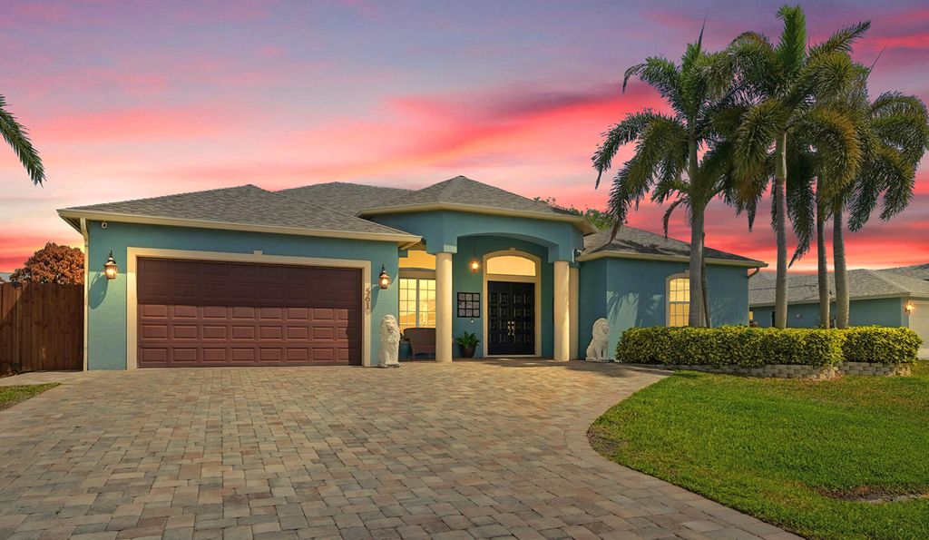 Photo of 561 SW Prater Avenue, Port Saint Lucie, FL 34953 (MLS # B26012561)