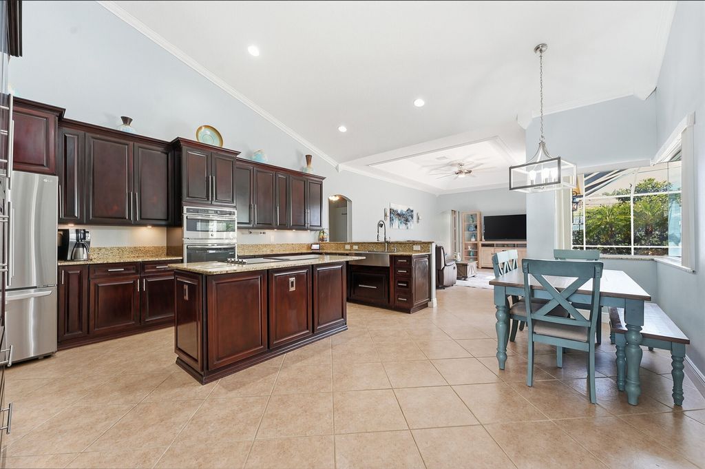 Photo of 561 SW Prater Avenue, Port Saint Lucie, FL 34953 (MLS # B26012561)