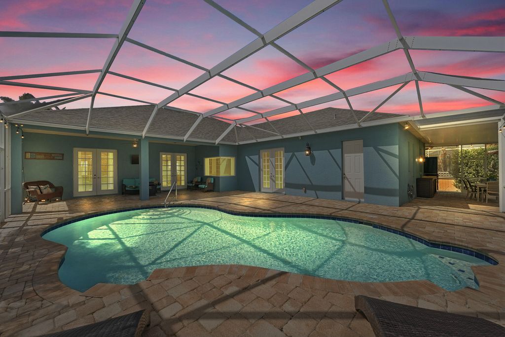 Photo of 561 SW Prater Avenue, Port Saint Lucie, FL 34953 (MLS # B26012561)