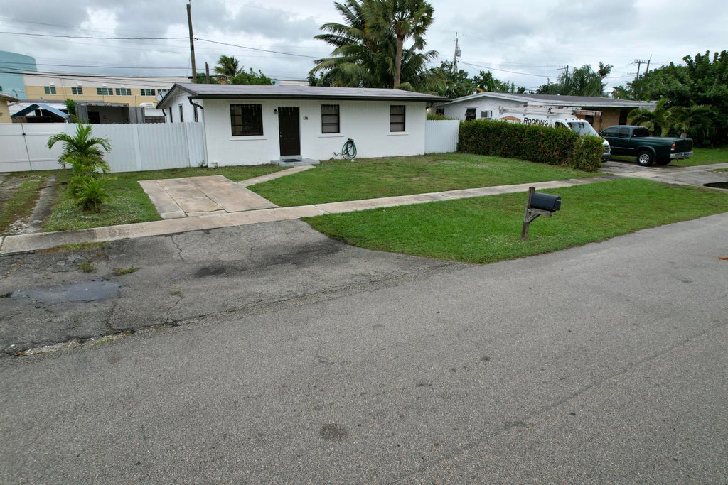 Photo of 176 Jamaica Drive, Palm Springs, FL 33461 (MLS # R10943969)