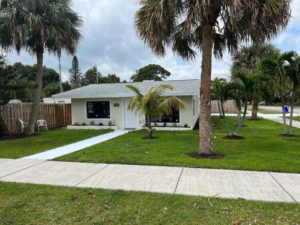 Photo of 1370 NE Martin Avenue, Jensen Beach, FL 34957 (MLS # R10944471)