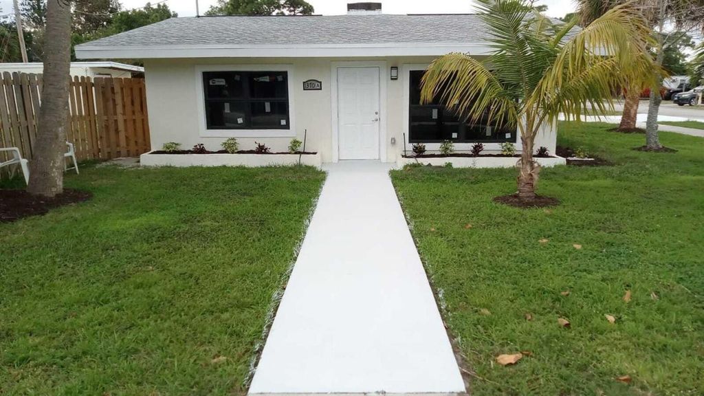 Photo of 1370 NE Martin Avenue, Jensen Beach, FL 34957 (MLS # R10944471)